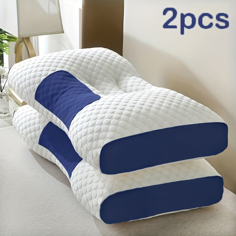 Two white and blue pillows on a bed with '2pcs' text above.