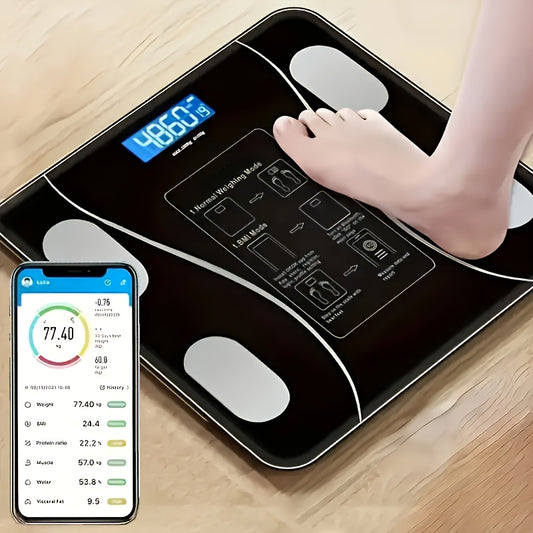 Digital body fat scale with a smartphone app displaying health metrics on a wooden floor.