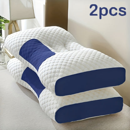 Two white and blue pillows on a bed with '2pcs' text above.