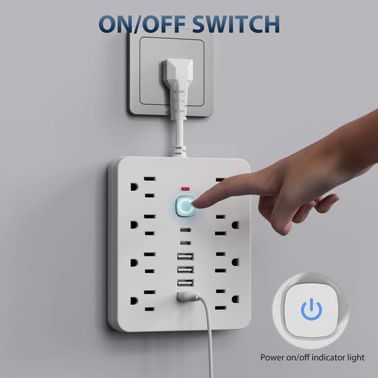 Wall-mounted power strip with on/off switch and multiple outlets, hand pressing the switch.