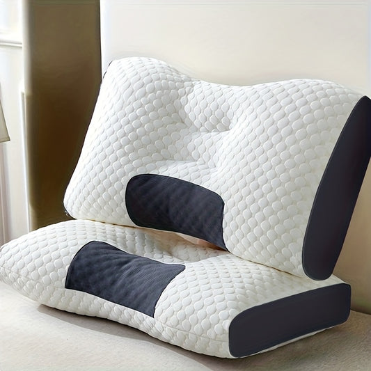 White and black wedge-shaped pillow on a light surface